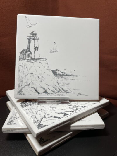 Set of 4  "Lighthouse on Seaside Image"  in Black & White on Laser Engraved Ceramic Tile Coasters.    Great Gifts